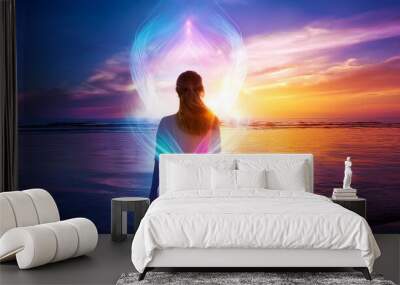 Spiritual woman person glow on water with colorful aura and energy. Wall mural