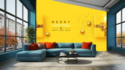 Christmas background. Realistic yellow gift boxes, with shiny golden confetti, Xmas balls, decorative baubles. Flat lay, top view. Festive New Year poster, greeting cards, banner. vector illustration Wall mural