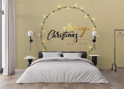 Glowing Christmas lights wreath for Xmas holiday greeting cards design. Wall mural