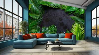 lush tropical green plants after rain; with black texture space in center for text Wall mural