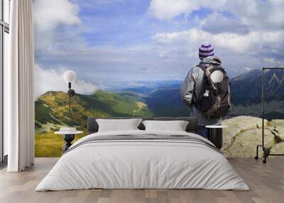 Young man hiking in Tatra mountains near Zakopane / Kasprowy Wierch Wall mural