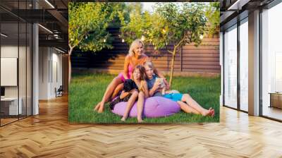 Happy family with dog and cat on nature Wall mural