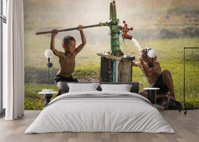 Two young boy rocking groundwater bathe in the hot days, Country Wall mural