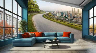 Road with cityscape and skyline in Kuala Lumpur, Malaysia. Sunrise Scene. Logo removed. Wall mural