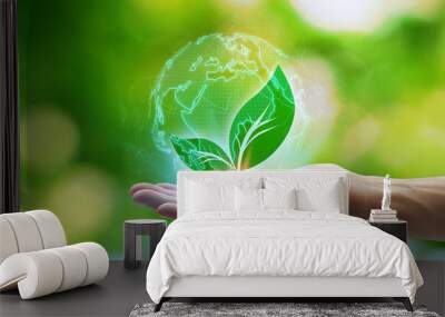 Hand holding with leaf icons in the Earth Network connection on nature background, Technology ecology concept. Environmental protection concept Wall mural