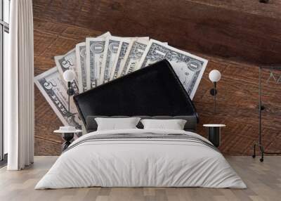 wallet with money on wood background Wall mural