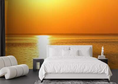 Orange sun over the sea horizon, beautiful sunset, copy space, landscape with a big sun, bloody horizon above the water surface, blank for the designer, orange pattern Wall mural