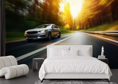 Car is driving on country road with motion blur effect. Modern car is moving at high speed in natural landscape Wall mural