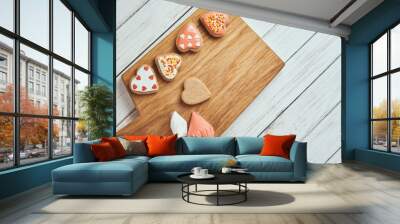 Decorated gingerbread cookies with icing on the table Wall mural