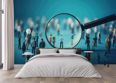 Magnifying glass looking for people on blue background. Searching candidates for employment in the labor market Wall mural