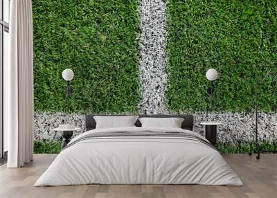 Part of football or soccer field close up, Artifical green grass with white border lines, Astroturf at stadium for spart games Wall mural