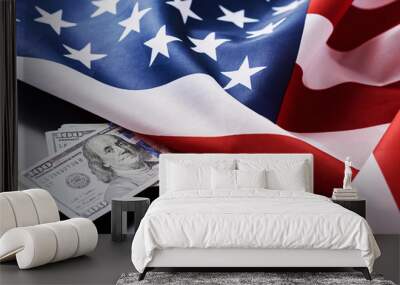 USA national flag and currency usd money banknotes on a dark background. Business and finance concept Wall mural