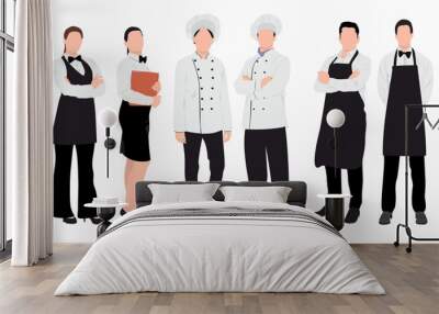 Team of chefs with waiter and waitress standing together in isolated white background.
 Wall mural