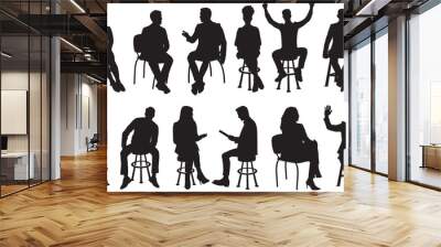 Vector silhouettes of a men and a women sitting on a chair and stool, a group of business people, black color on a transparent background Wall mural