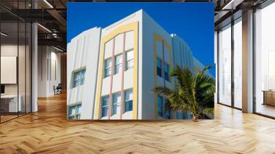 Detail close-up of typical colorful Art Deco architecture with tropical palm tree on Ocean Drive in South Beach, Miami, Florida Wall mural