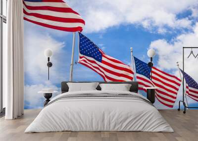 Row of US stars and stripes flags fluttering in the wind Wall mural