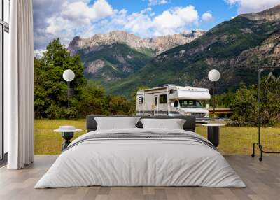 Panoramic view of MOTORHOME RV In Chilean landscape in Andes. Family trip traval vacation in mauntains Wall mural