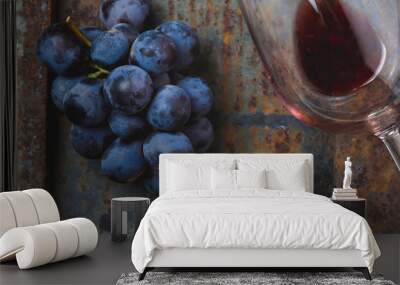 Wine concept - wine, grape on rustik dark background. Top wiew Wall mural