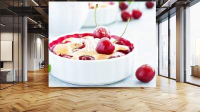 Cherry clafoutis - traditional French sweet fruit dessert. Wall mural