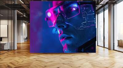 A man with a futuristic look on his face wearing glasses with neon blue color scheme Wall mural