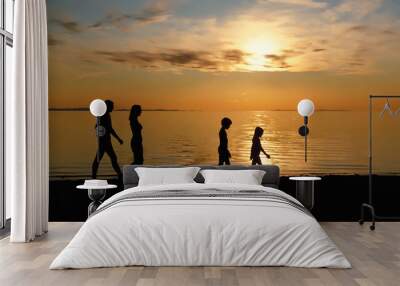 Family Walking Beach At Sunset Wall mural