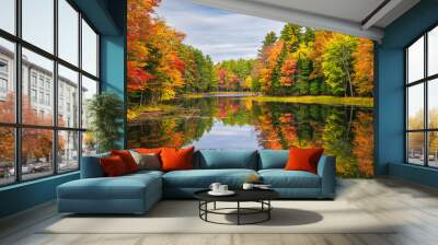 Colorful foliage tree reflections in calm pond water on a beautiful autumn day in New England Wall mural