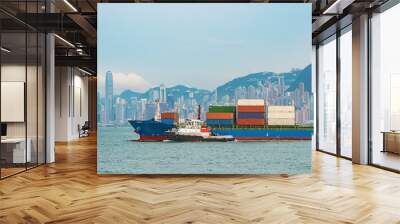 Cargo ship in Victoria Harbor of Hong Kong city Wall mural