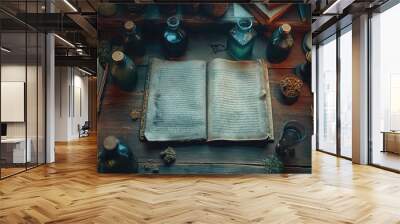 Open Book with Vintage Bottles and Candlelight on Wooden Table Wall mural