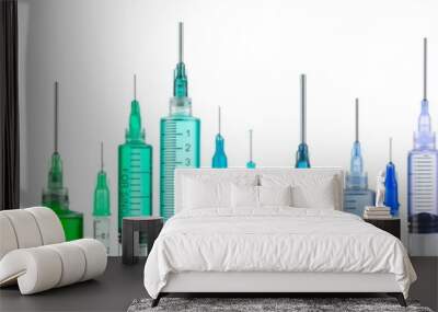 Row of bright colorful syringes Wall mural