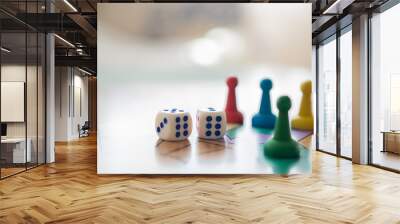 Colorful, bright game chips stand on a game Board with playing cubes: the concept of Board games, the background, games at home, a place for text Wall mural