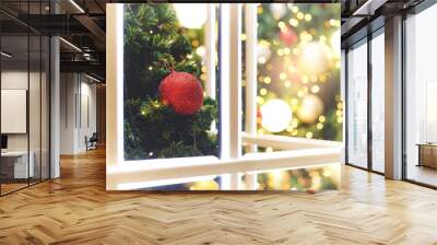 Christmas holidays with decorations, tree, red ball, window fram and bokeh background Wall mural