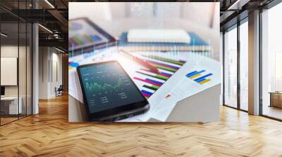 Double explosure with business chart, business people use technology from mobile and tablet computer with chart on screen to analysis investment plan Wall mural