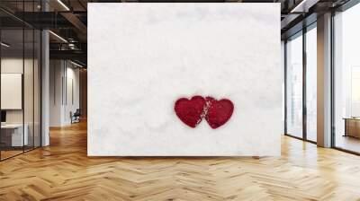 two hearts on white snow, valentines day background, free space for text Wall mural