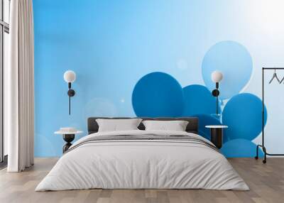 Color of 2020 year, classic blue. Group of balloons with helium on the sky background. Trend color. Wall mural