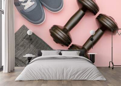 Concept - sports accessories and watches to remind you of sports on a pink background.  Wall mural