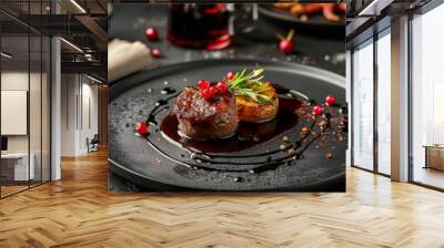 A black plate holds succulent meat covered in rich sauce, a culinary masterpiece Wall mural