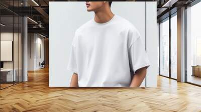 A handsome young model wearing blank tshirt for mockup template Wall mural