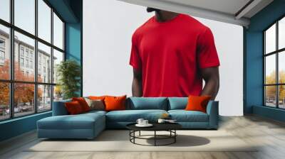 A young man in a bold red shirt poses stylishly against a neutral backdrop Wall mural