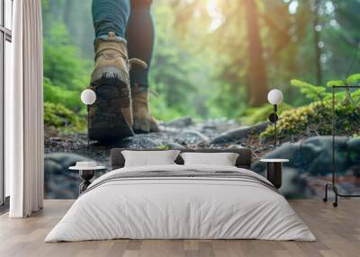 Close-up of person feet hiking in the woods. Wall mural