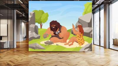 Prehistoric stone ages and primitive couple people work vector illustration. Cartoon neanderthal man woman characters sitting, caveman holding hammer work tools to break stone near cave background Wall mural