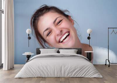 young woman smiling Wall mural