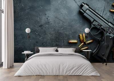 Black Handgun and Bullets on a Dark Surface Wall mural