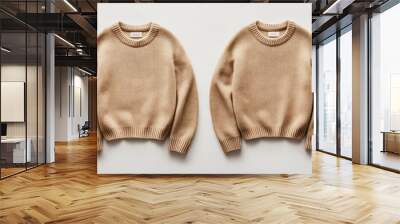 Two Tan Knit Sweaters on a White Background Wall mural