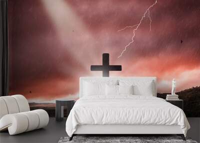 Silhouette of crucifix cross at sunset time with holy light and thunderstorm background. Wall mural