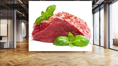 Fresh raw meat beef piece with spices and basil leaf isolated on white background Wall mural