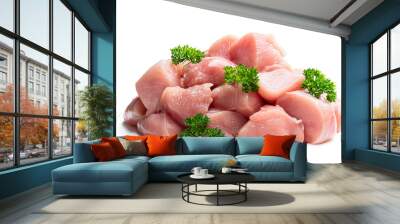 Raw chicken breast fillet chunks with parsley herb isolated on white Wall mural