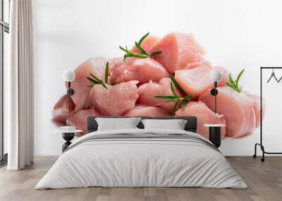 Raw chicken breast fillet chunks with rosemary herb isolated on white Wall mural