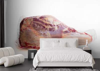 Vacuum pack of raw lamb leg isolated on white Wall mural