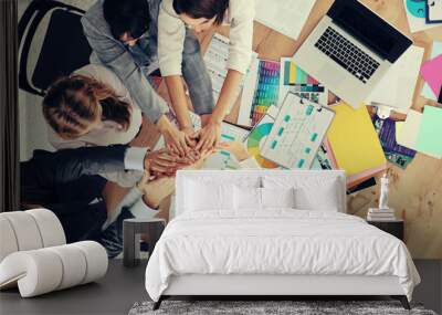 Business team with hands together - teamwork concepts Wall mural