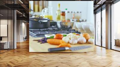 Composition with wooden board and ingredients for cooking on ta Wall mural